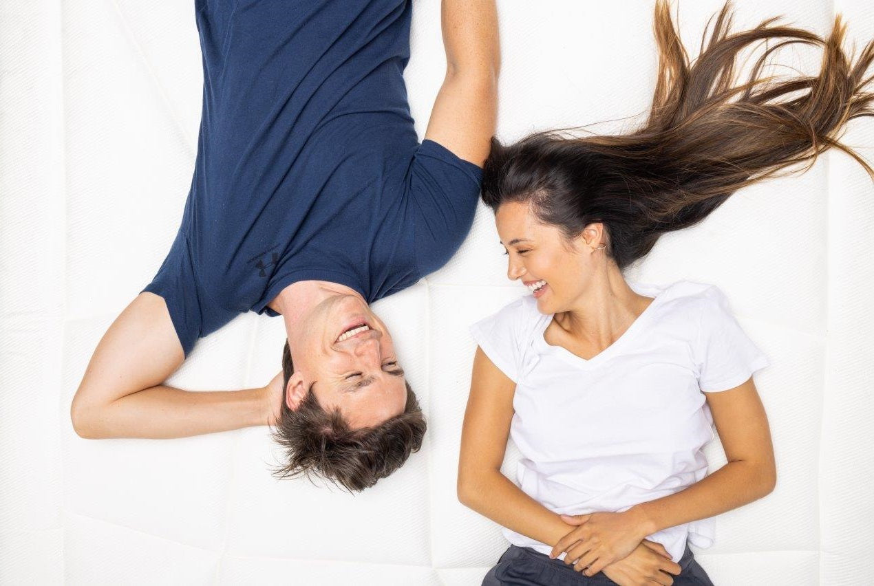 Couple Laying on the Mattress