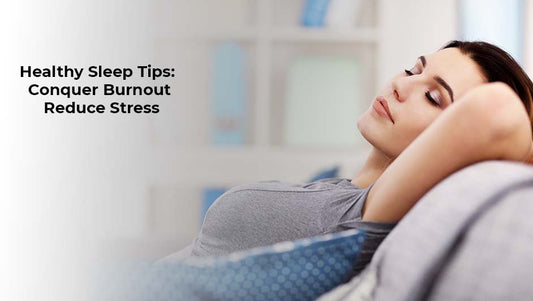 A woman sleeping peacefully in a comfortable bed, representing healthy sleep habits to reduce stress and overcome burnout.