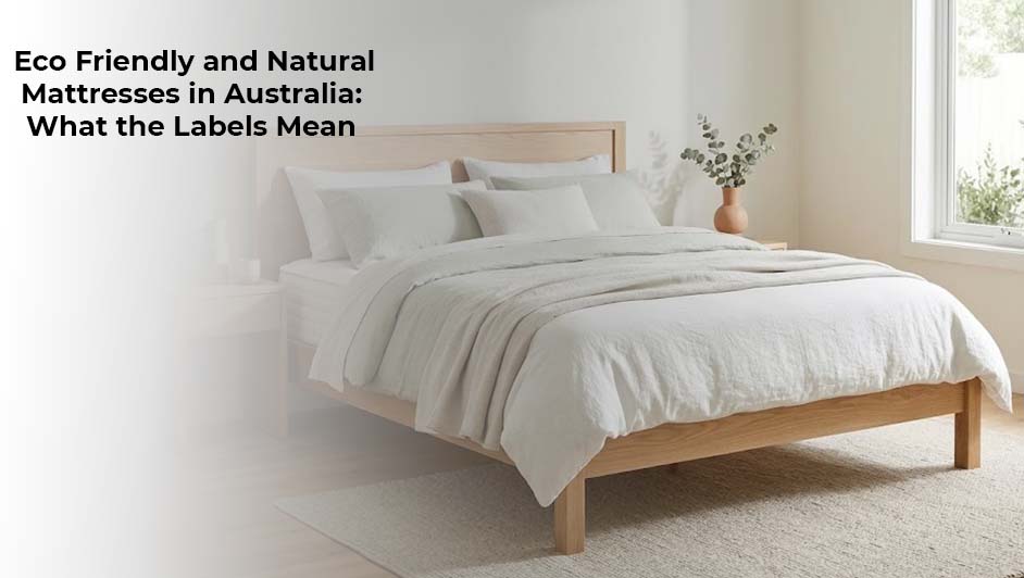 Natural wood bed frame with a white mattress and neutral bedding in a bright, minimalist bedroom, illustrating eco-friendly mattress options.