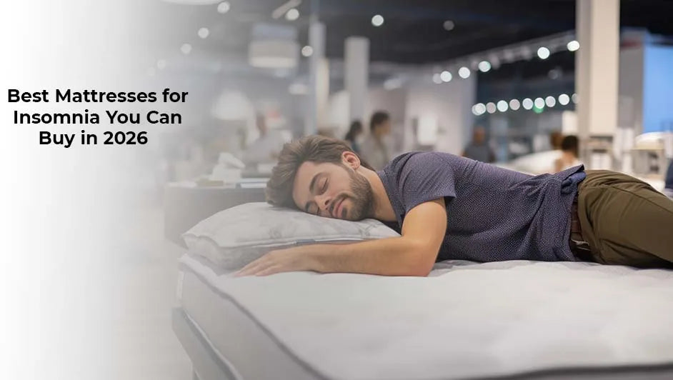 sleeping man testing a comfortable mattress in a showroom representing best mattresses for insomnia in 2026