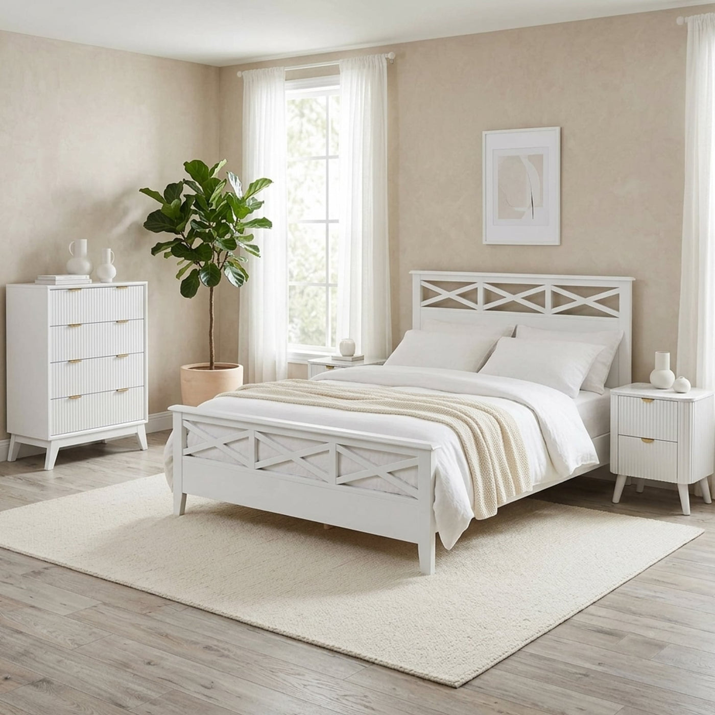 A styled white bedroom suite